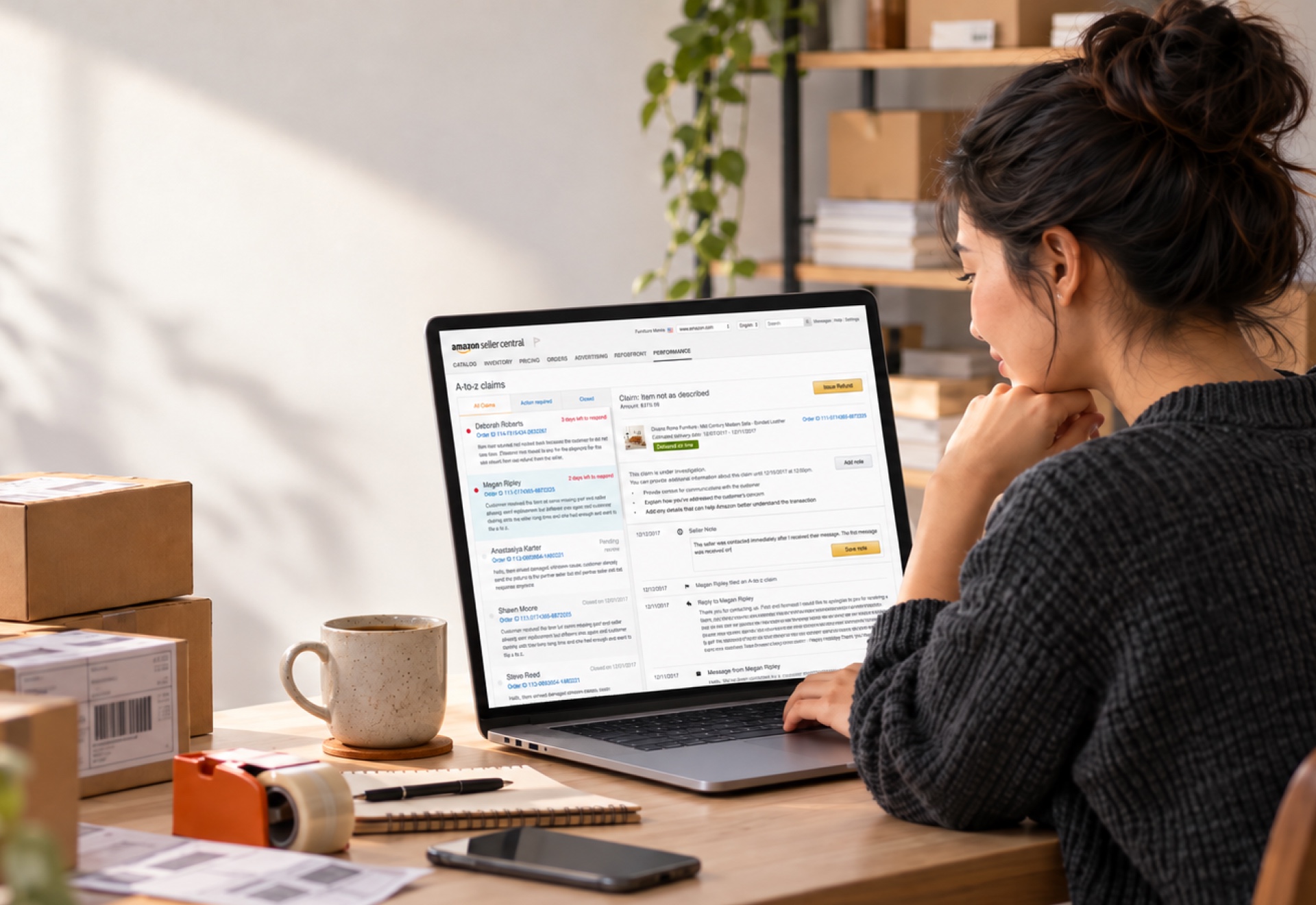 A seller at a home workspace reviewing the A-to-z claims list in Amazon Seller Central on a laptop